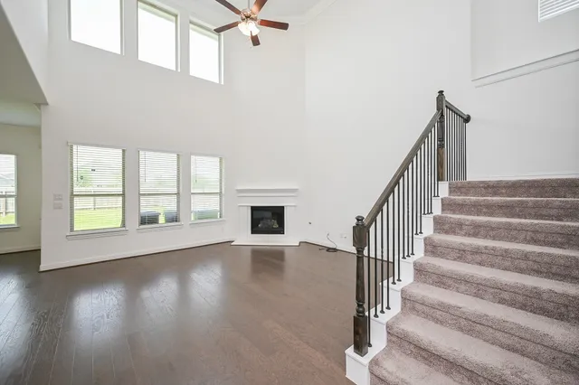 a view of an entryway with wooden floor and a window