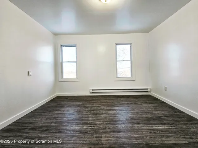 an empty room with window