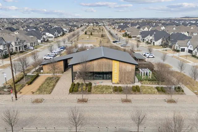an aerial view of a house with a garden