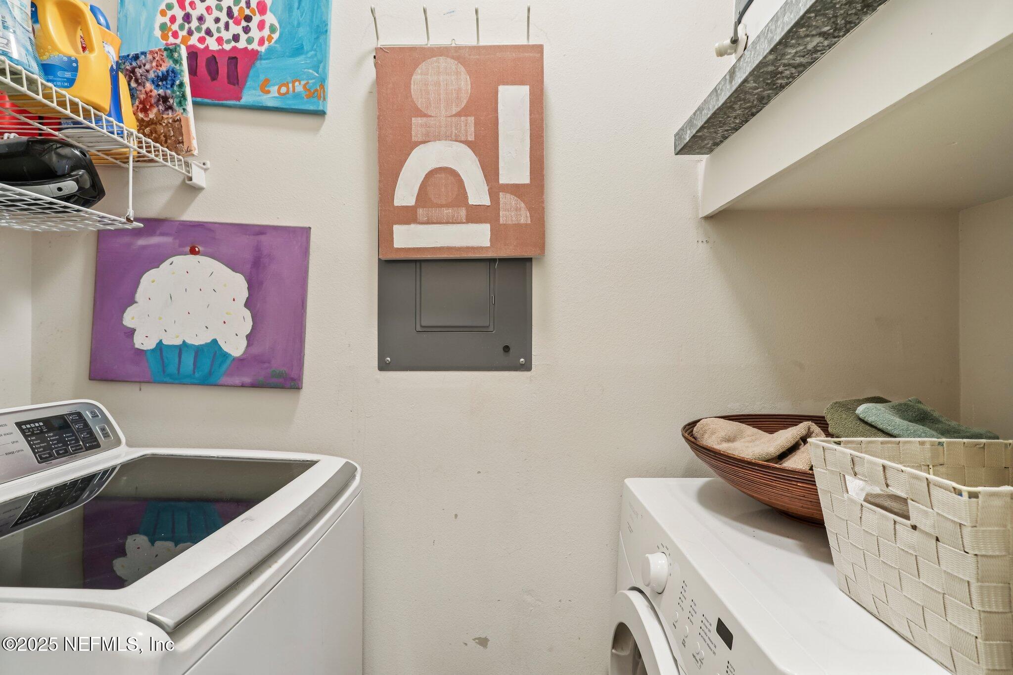 201 Colima Court, Unit 1221 Ponte Vedra Beach, FL 32082 - Photo 35 of 50 a utility room with dryer and washer