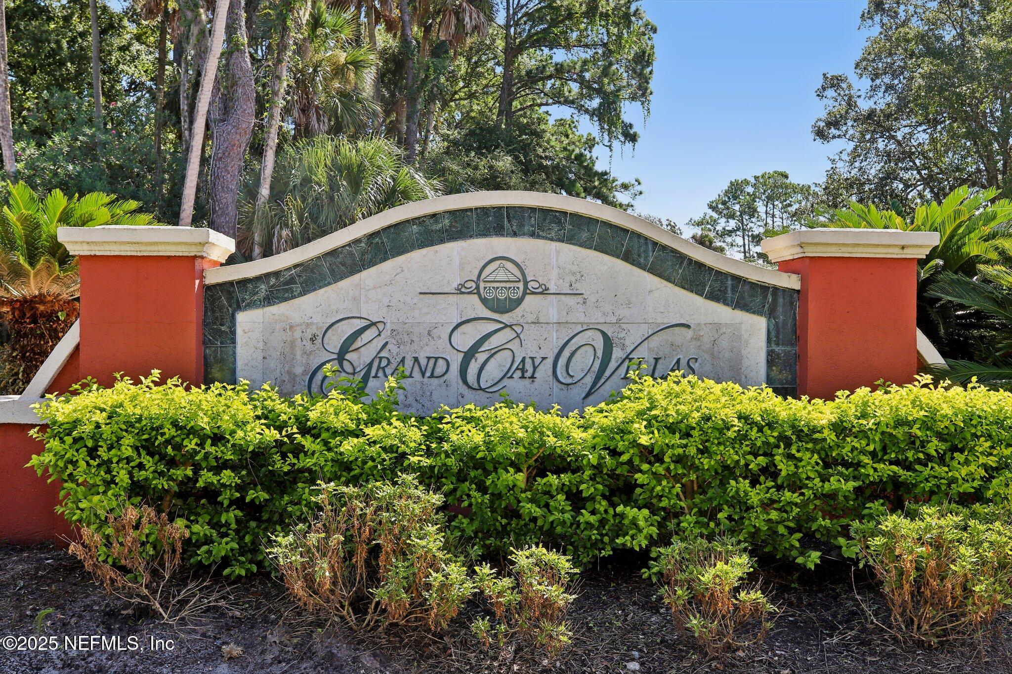 201 Colima Court, Unit 1221 Ponte Vedra Beach, FL 32082 - Photo 4 of 50 a view of a sign in a garden