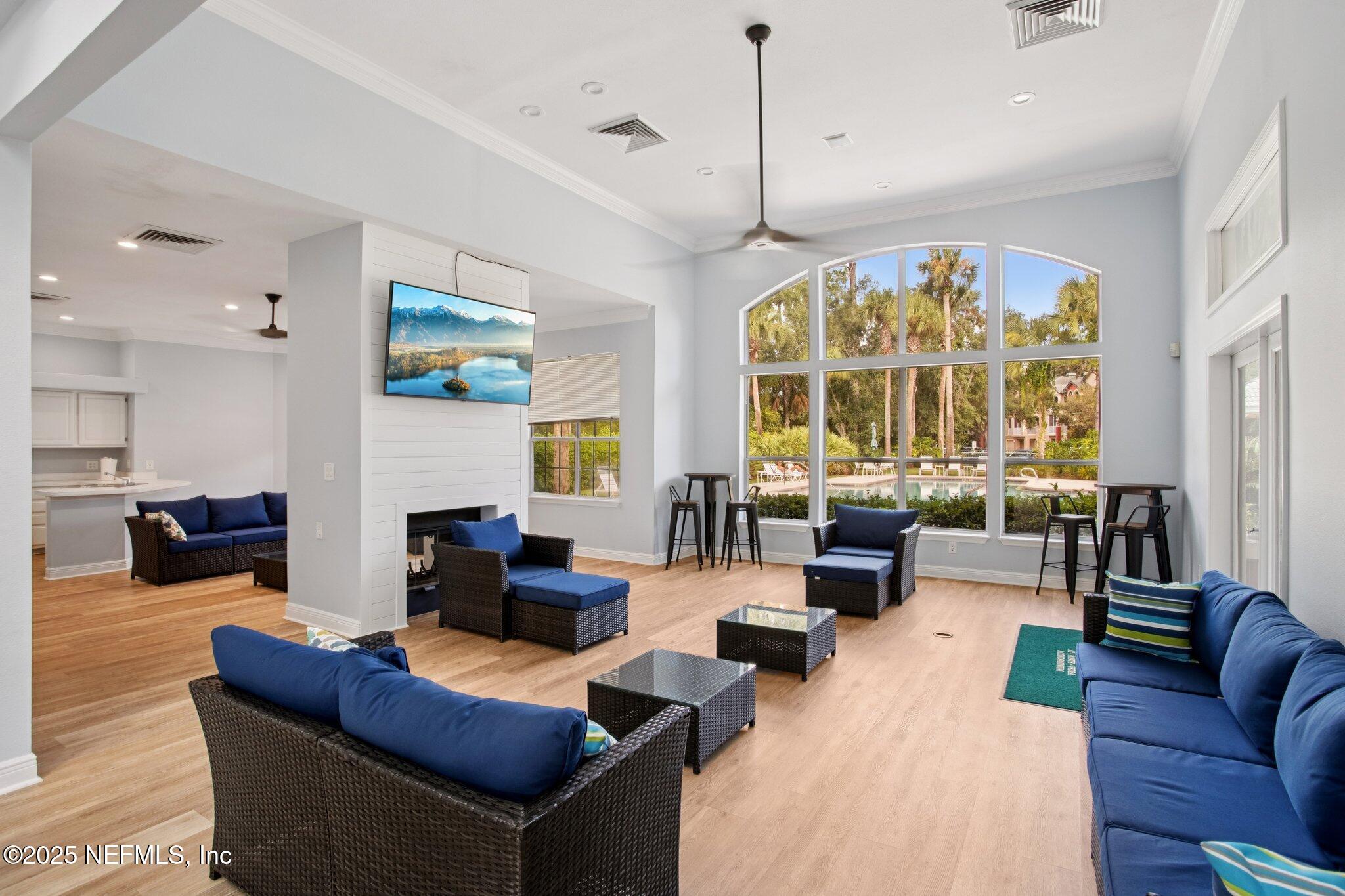 201 Colima Court, Unit 1221 Ponte Vedra Beach, FL 32082 - Photo 41 of 50 a living room with furniture large window and outdoor view