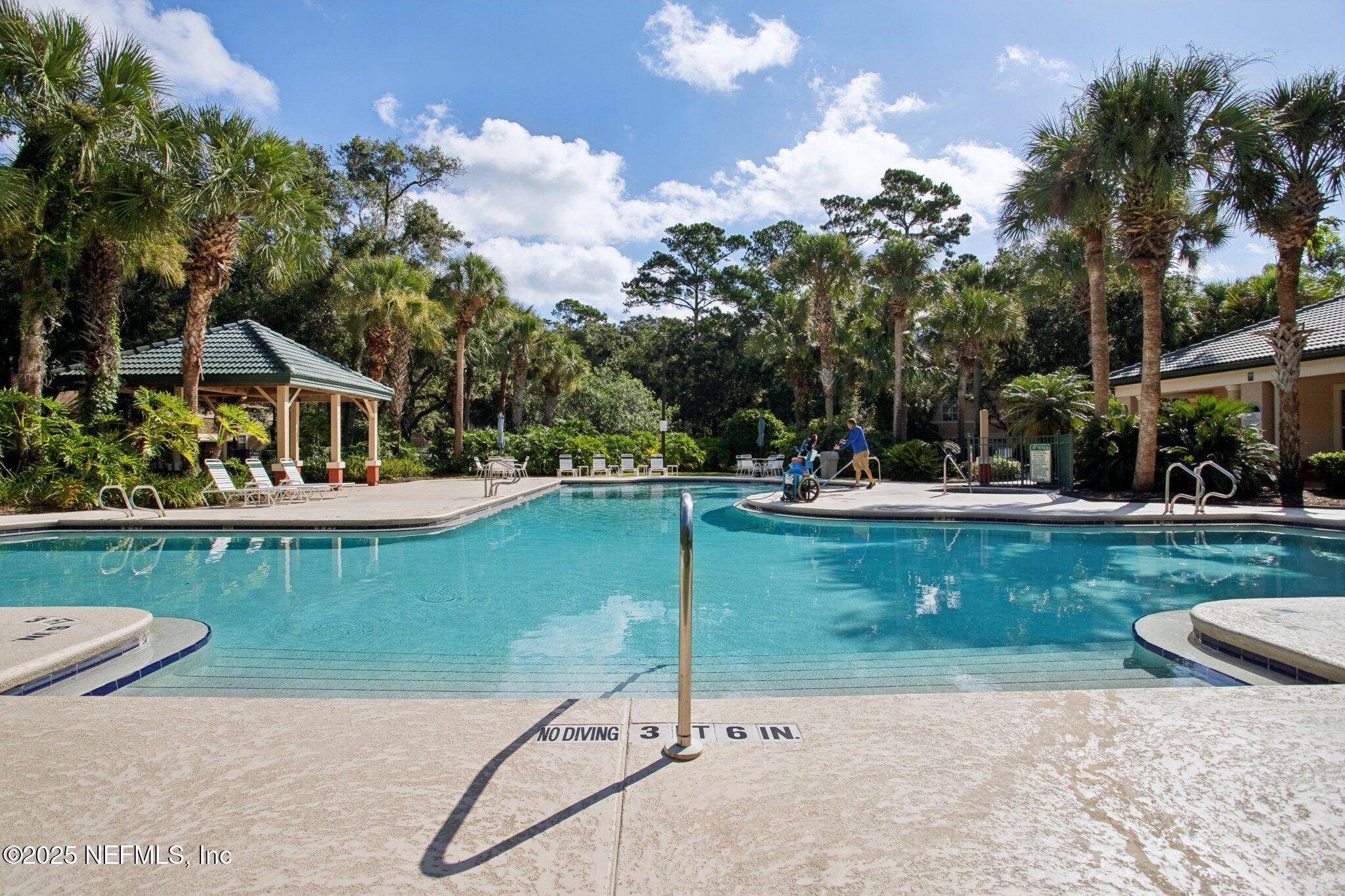 201 Colima Court, Unit 1221 Ponte Vedra Beach, FL 32082 - Photo 47 of 50 a garden view with a fountain