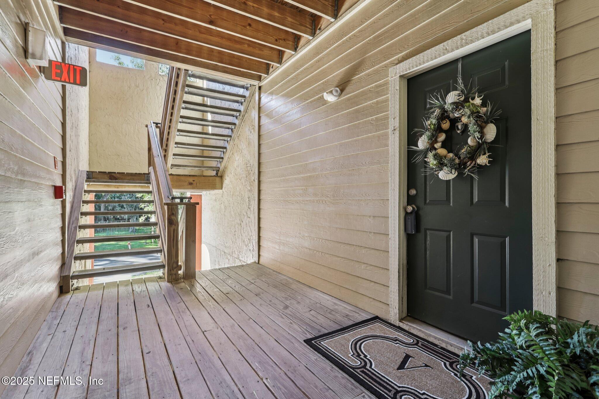 201 Colima Court, Unit 1221 Ponte Vedra Beach, FL 32082 - Photo 8 of 50 a view of wooden floor in a house