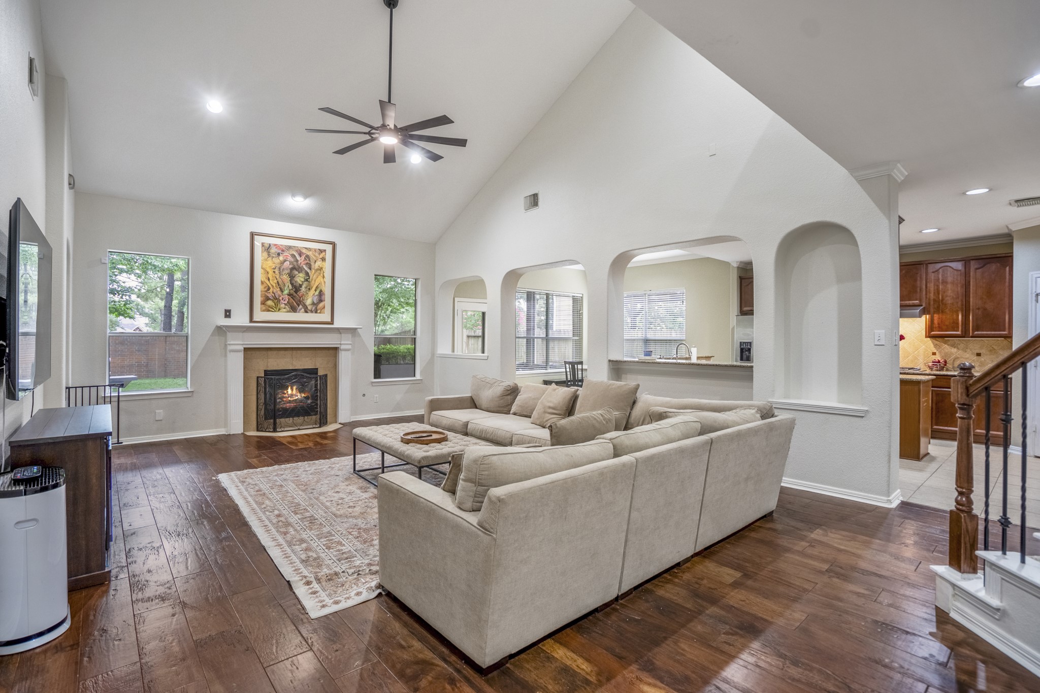 10410 Pitcataway Drive Spring, TX 77379 - Photo 46 of 48 The spacious open floorplan of the family room offers wonderful views of the backyard, art niches and a breakfast bar for easy dining / living lifestyles of the modern family.