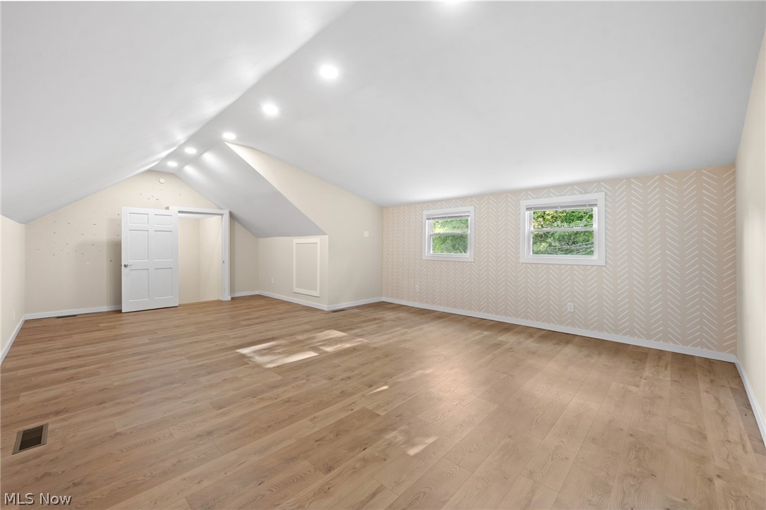 1617 Graham Road Stow, OH 44224 - Photo 46 of 49 Bonus room with light hardwood / wood-style flooring and lofted ceiling