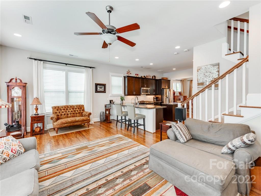 326 Mariemont Way Rock Hill, SC 29730 - Photo 14 of 36 a living room with furniture kitchen view and a large window