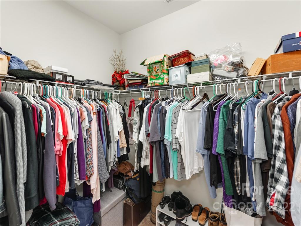 326 Mariemont Way Rock Hill, SC 29730 - Photo 24 of 36 a view of walk in closet with clothes and shoes