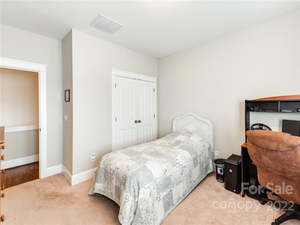 326 Mariemont Way Rock Hill, SC 29730 - Photo 29 of 36 a bedroom with a bed and a window