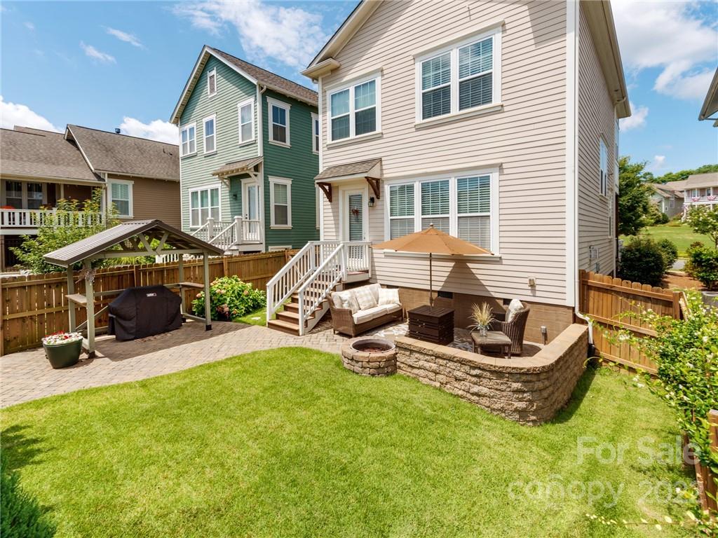 326 Mariemont Way Rock Hill, SC 29730 - Photo 33 of 36 a view of a house with a backyard and sitting area