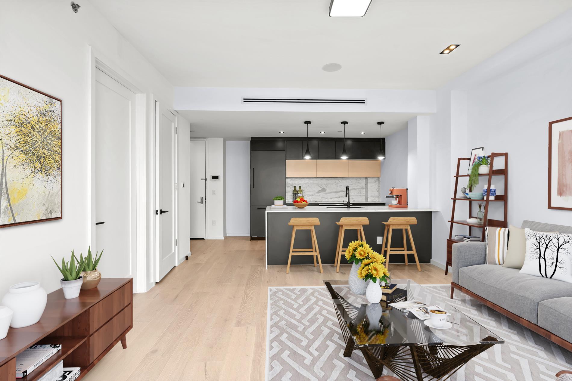 322 Lincoln Road, Unit 4A Brooklyn, NY 11225 - Photo 3 of 8 a living room with furniture a kitchen view and a fireplace