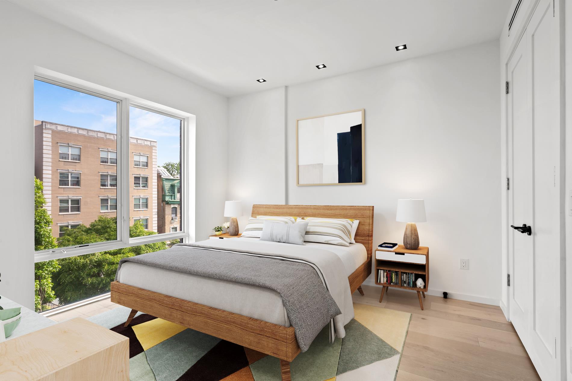 322 Lincoln Road, Unit 4A Brooklyn, NY 11225 - Photo 7 of 8 a bedroom with a bed and a window