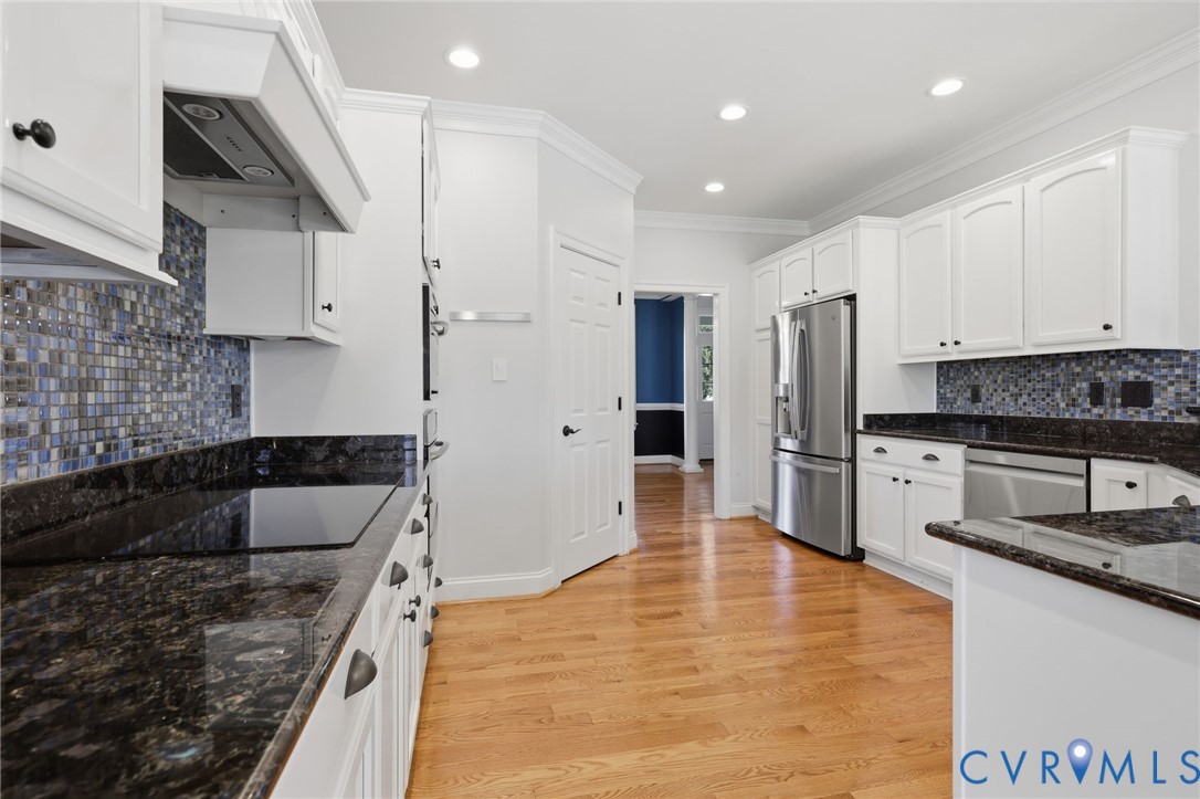 16225 Parrish Farm Road Montpelier, VA 23192 - Photo 17 of 55 Kitchen featuring hardwood flooring, white cabinet