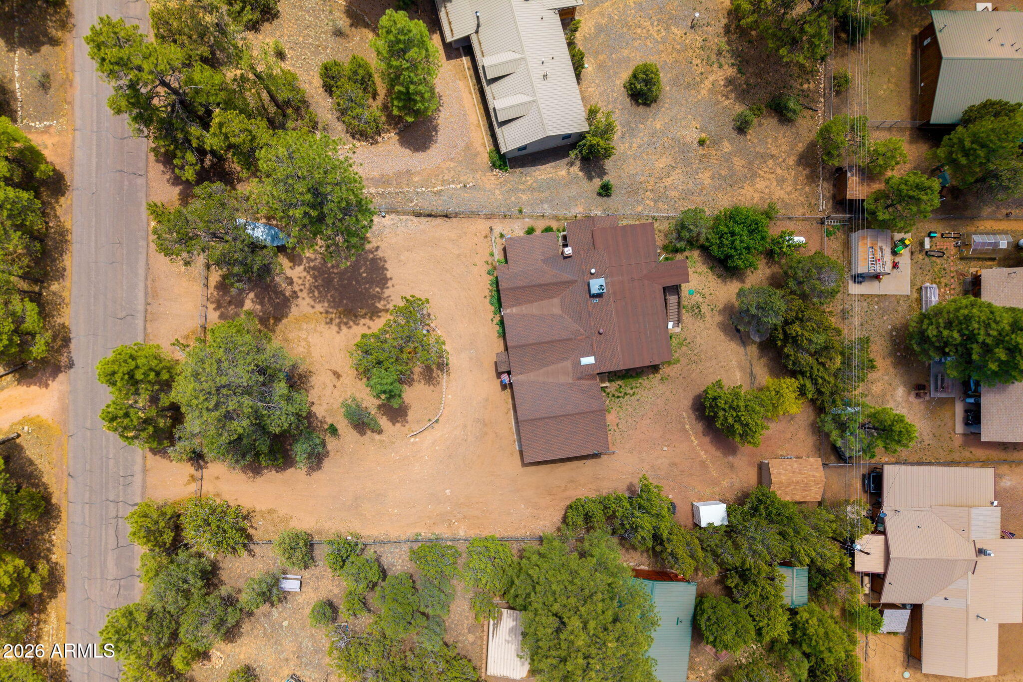 3384 Turkey Run Overgaard, AZ 85933 - Photo 32 of 37 an aerial view of a house with a yard