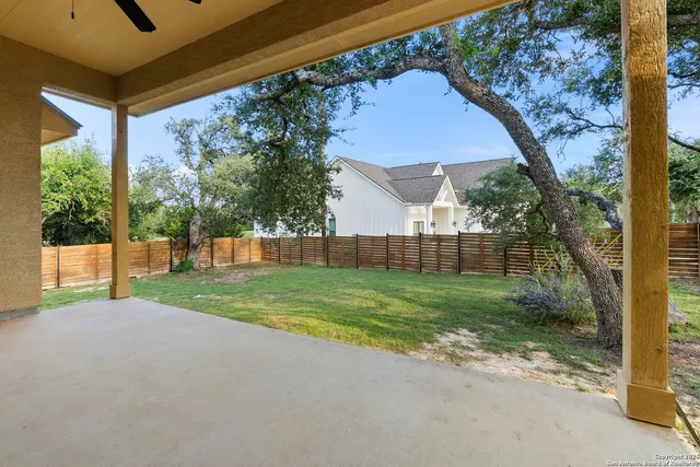 a view of a backyard with garden