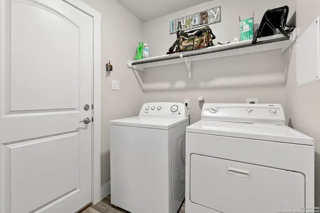 a utility room with dryer and washer