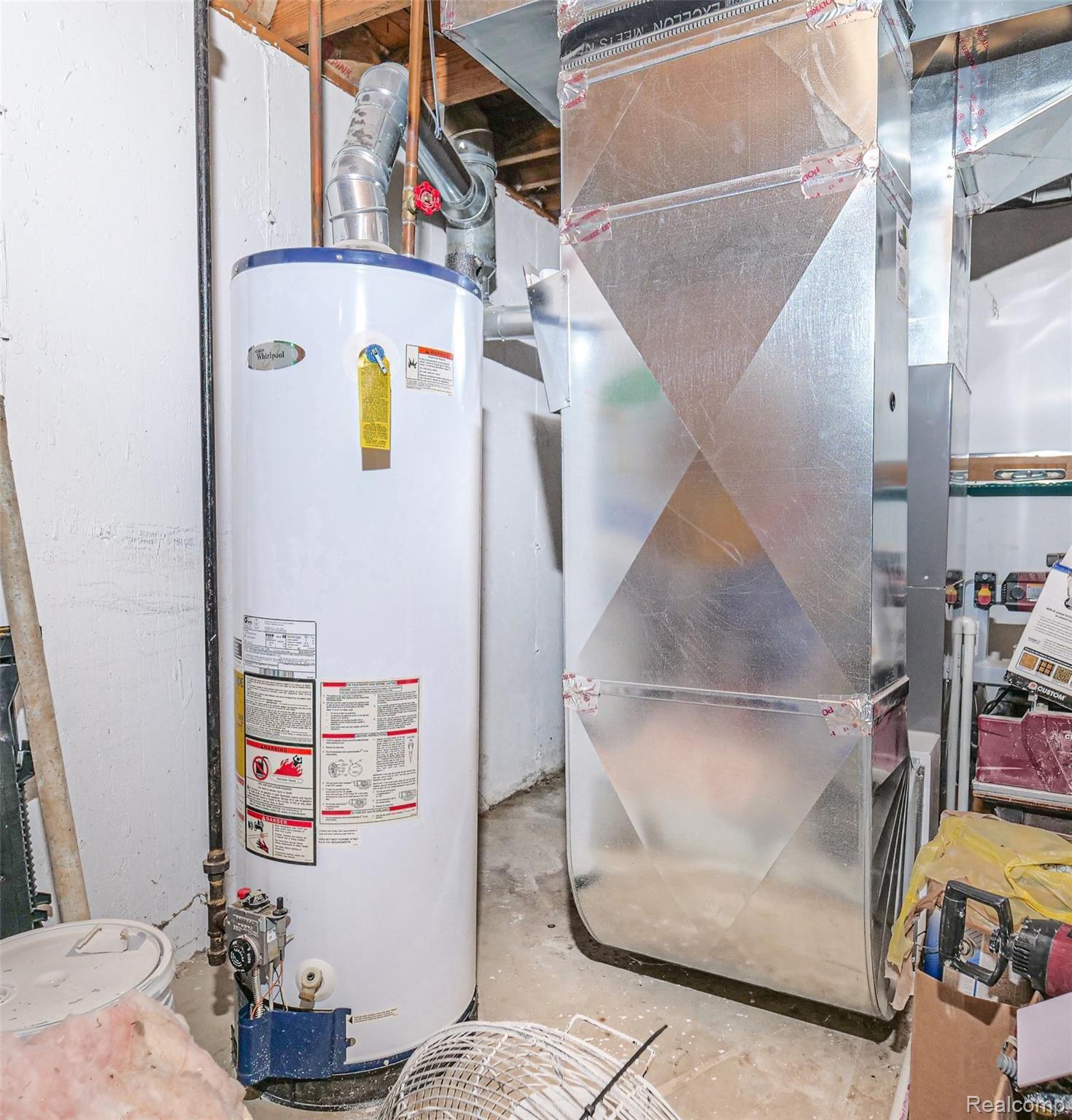 8668 Pettysville Road Pinckney, MI 48169 - Photo 32 of 33 Furnace Hot Water Heater.jpg