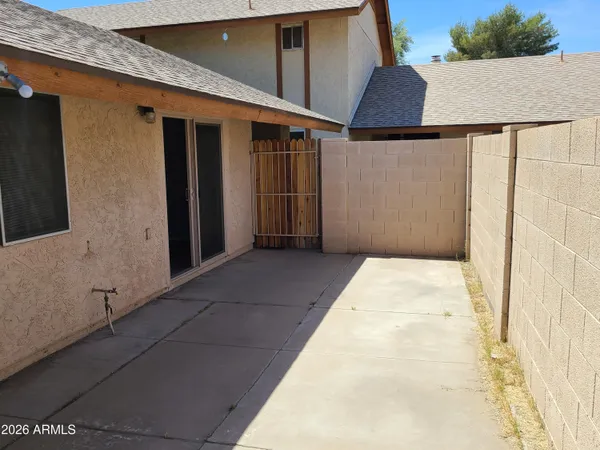 a view of a front door and wooden floor