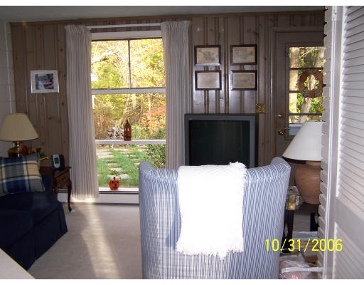 31 Irving Road Natick, MA 01760 - Photo 5 of 12 a living room with furniture and a window