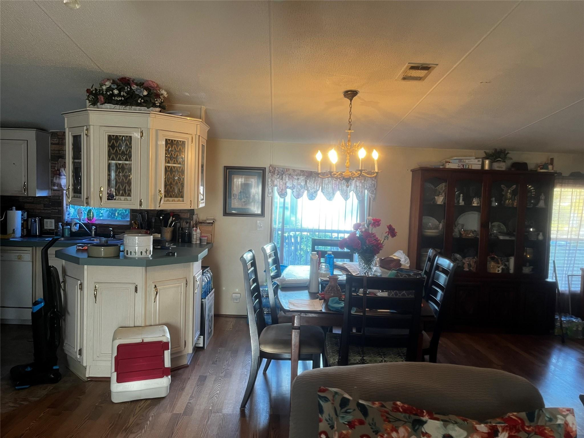 Undisclosed Address Davie, FL 33325 - Photo 12 of 19 a living room with furniture a dining table and a fireplace