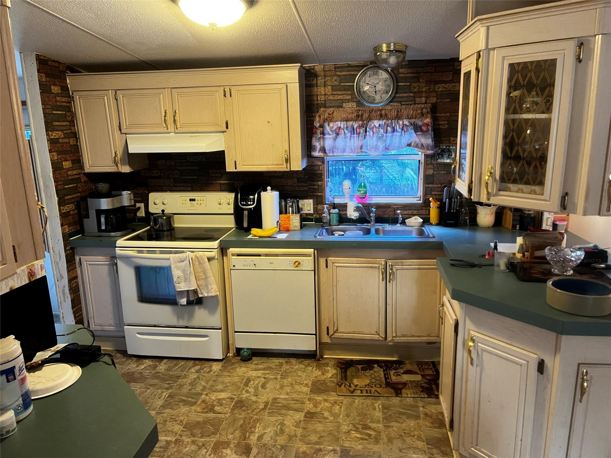 Undisclosed Address Davie, FL 33325 - Photo 14 of 19 a kitchen with a sink cabinets and window
