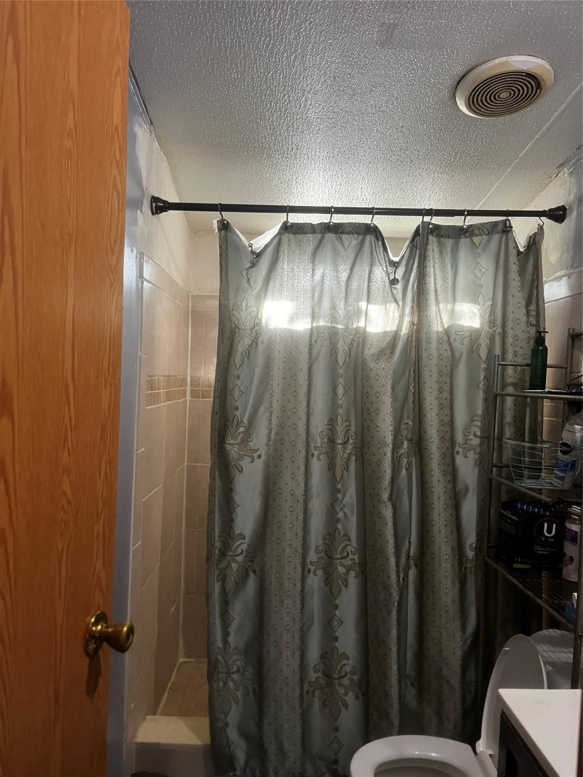 Undisclosed Address Davie, FL 33325 - Photo 18 of 19 a bathroom with a glass shower door and mirror