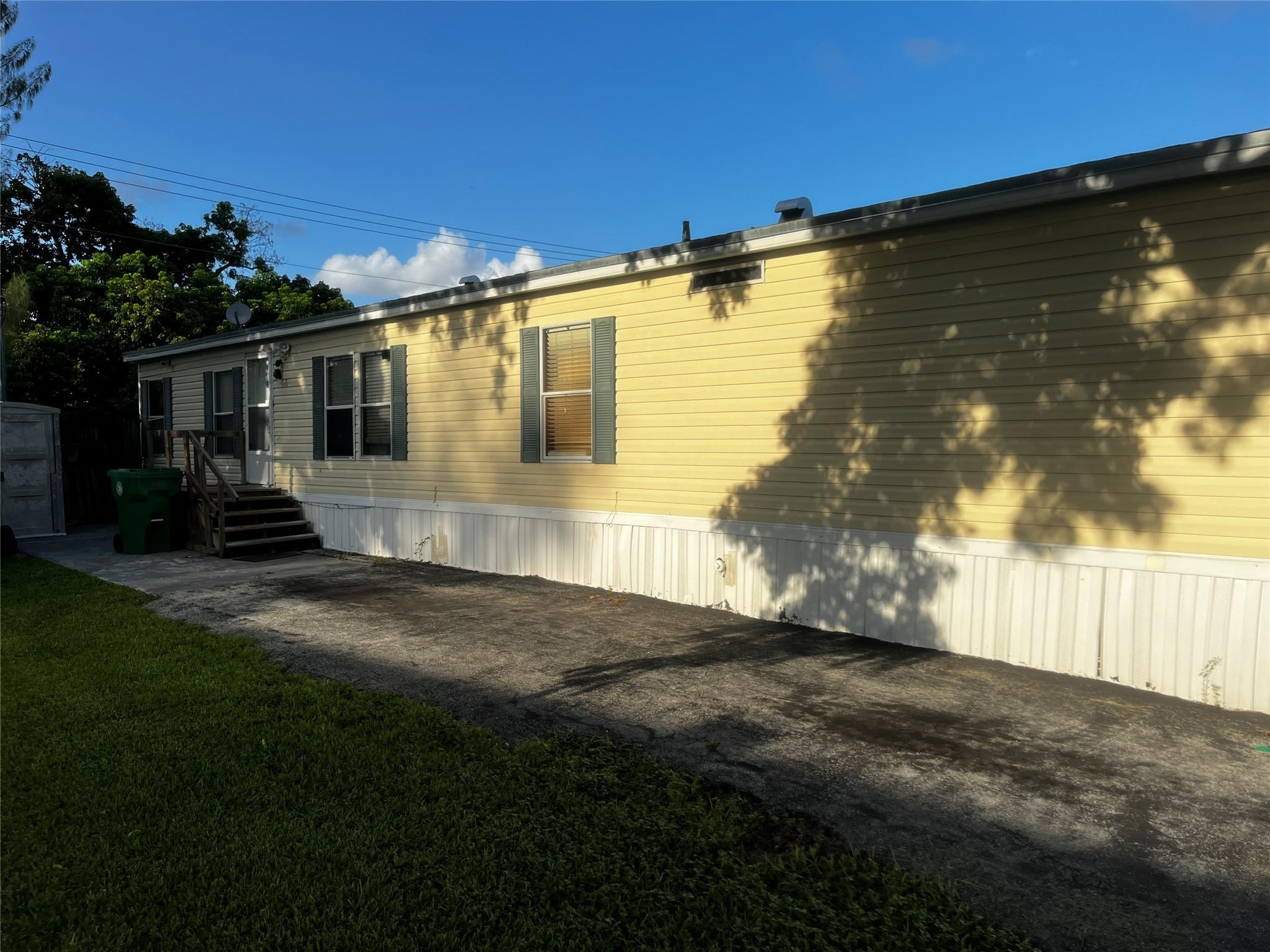 Undisclosed Address Davie, FL 33325 - Photo 3 of 19 a view of back yard of the house
