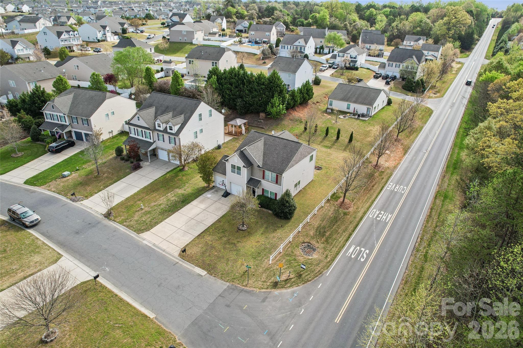 5000 Brodie Lane Fort Mill, SC 29707 - Photo 4 of 35 an aerial view of a house with a swimming pool