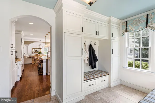 a view of a living room and entry way