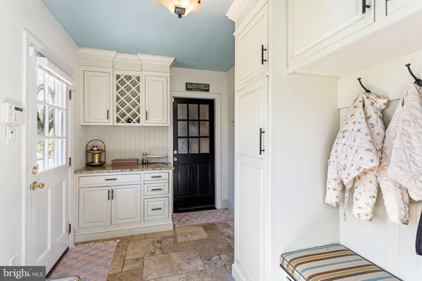 a view of cabinets and window