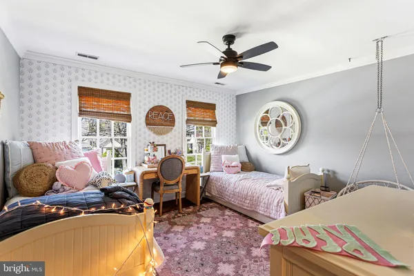 a living room with furniture and flat screen tv