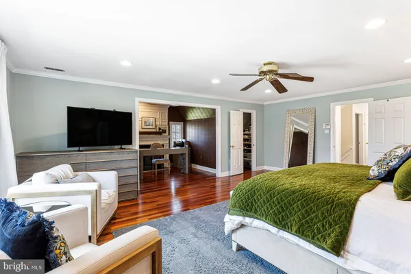 a view of kitchen with cabinets and wooden floor