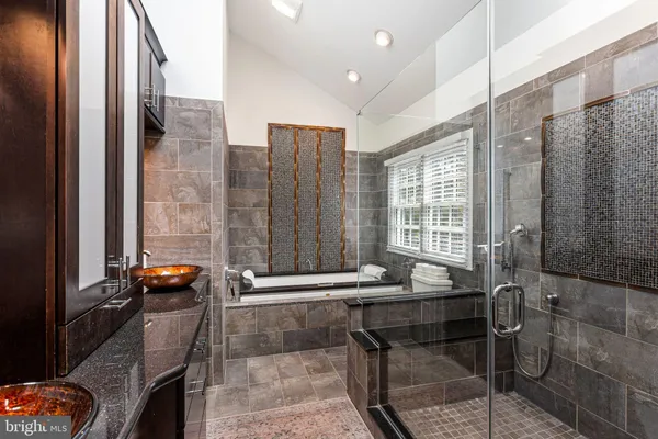 a bathroom with a sink and a shower