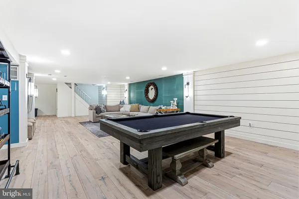 a bedroom with a bed and cabinet