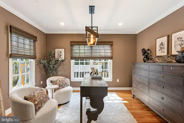 a living room with furniture and window