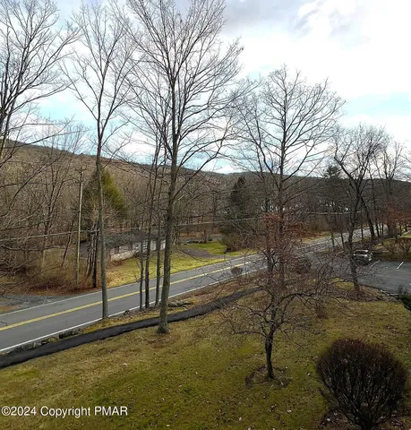 a view of backyard with green space