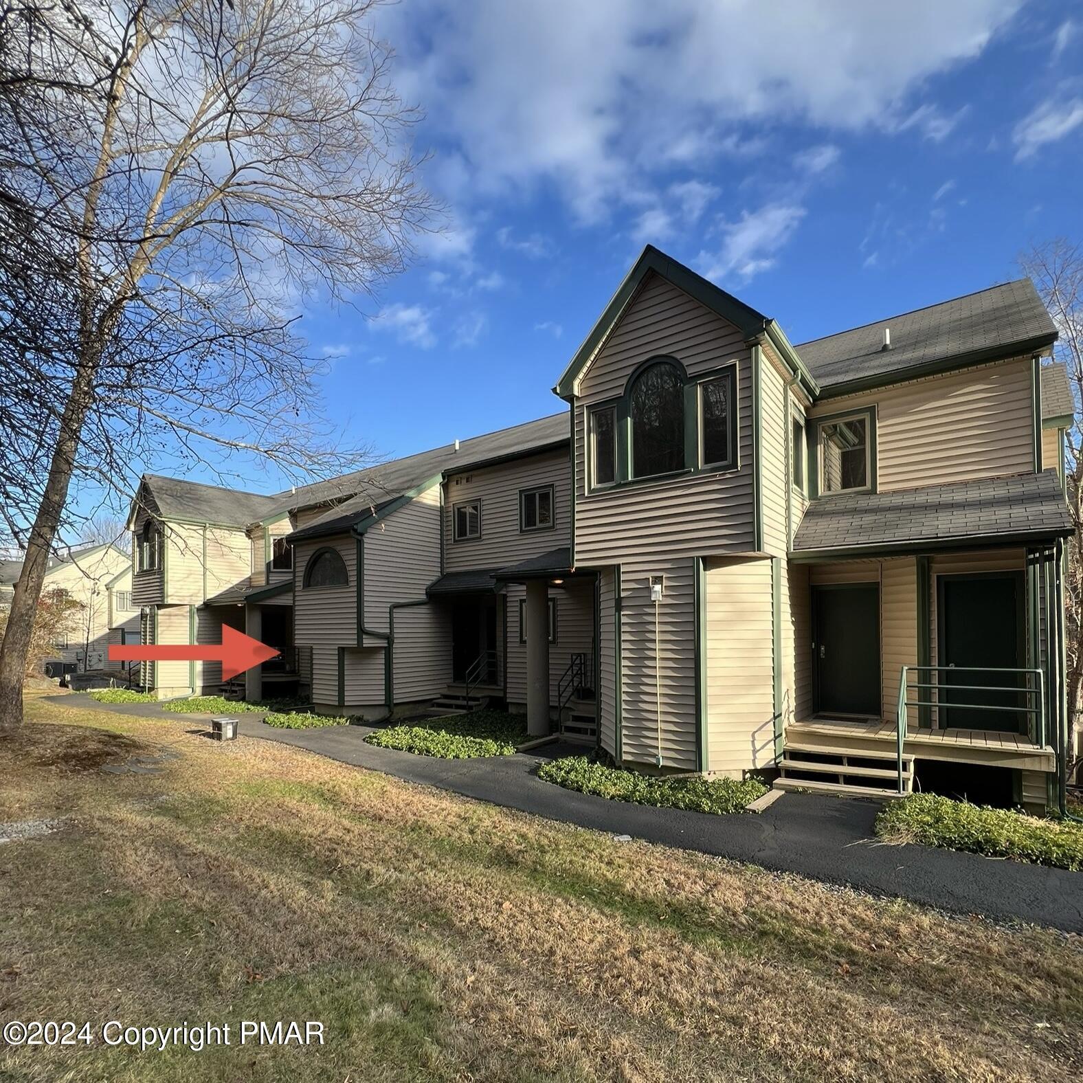 316 Hollow Road East Stroudsburg, PA 18302 - Photo 41 of 45 a front view of a house with a yard and garage