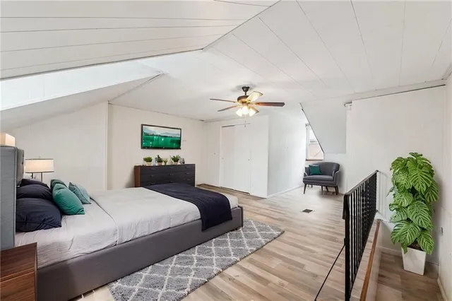 a bathroom with a toilet a sink and shower