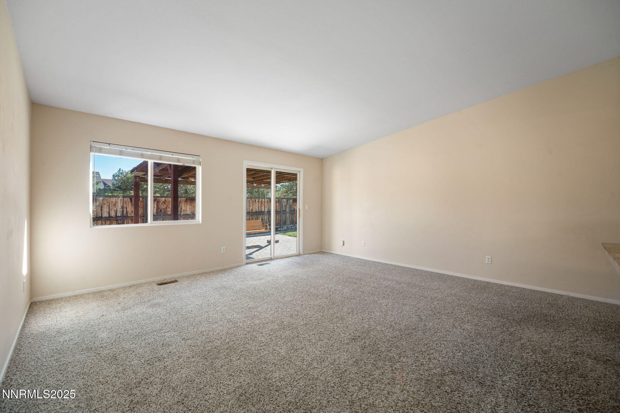 9770 Brightridge Drive Reno, NV 89506 - Photo 13 of 43 an empty room with windows