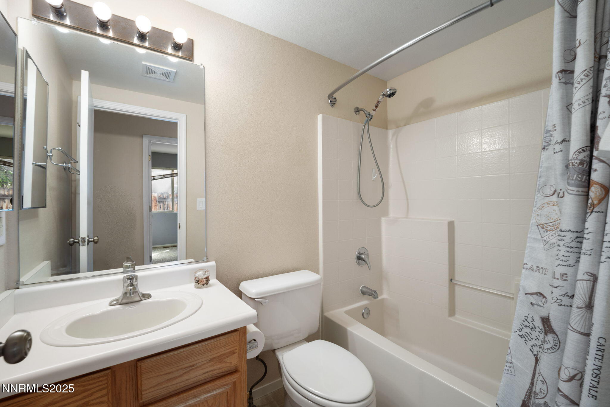 9770 Brightridge Drive Reno, NV 89506 - Photo 16 of 43 a bathroom with a sink toilet tub and shower