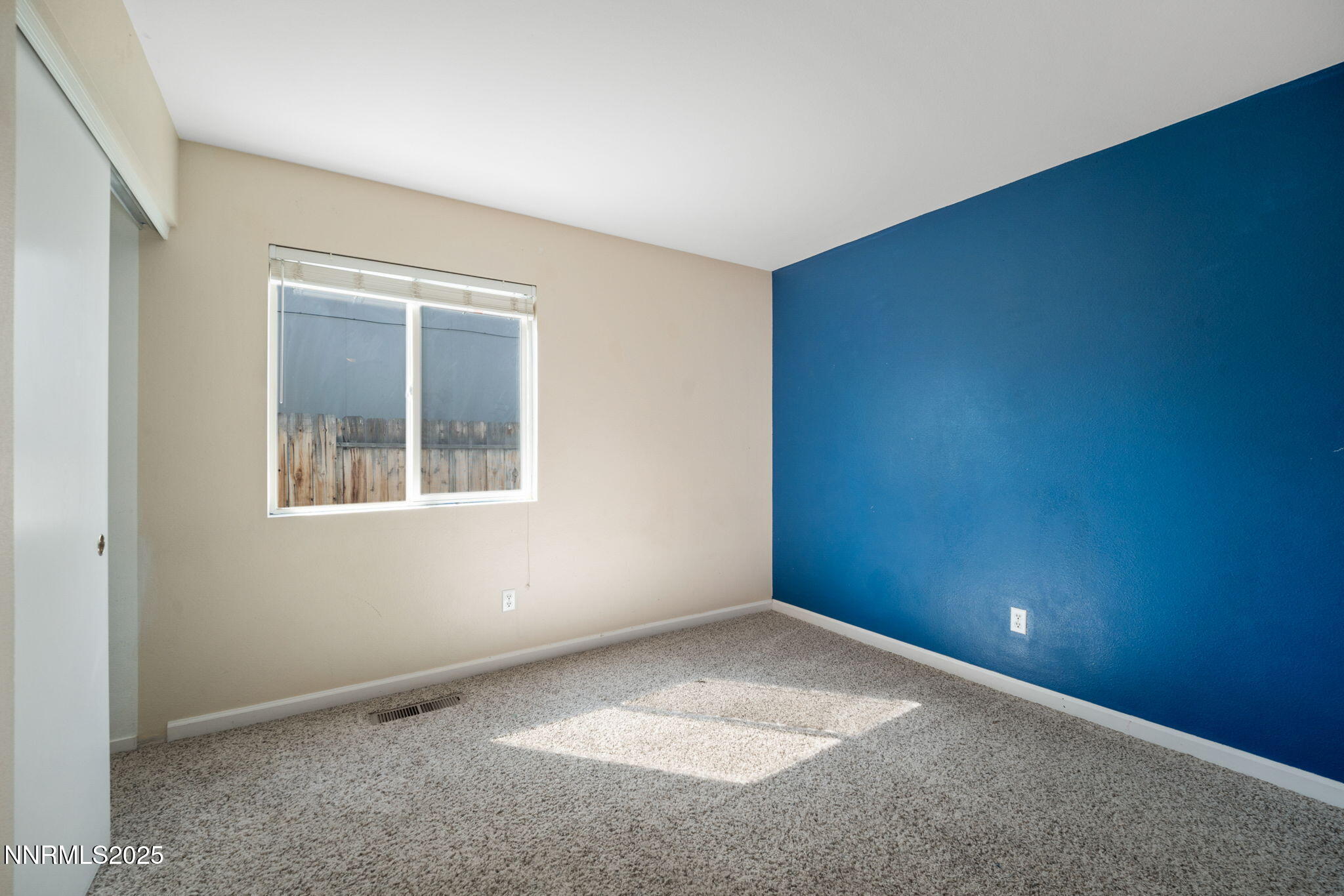 9770 Brightridge Drive Reno, NV 89506 - Photo 17 of 43 an empty room with a window