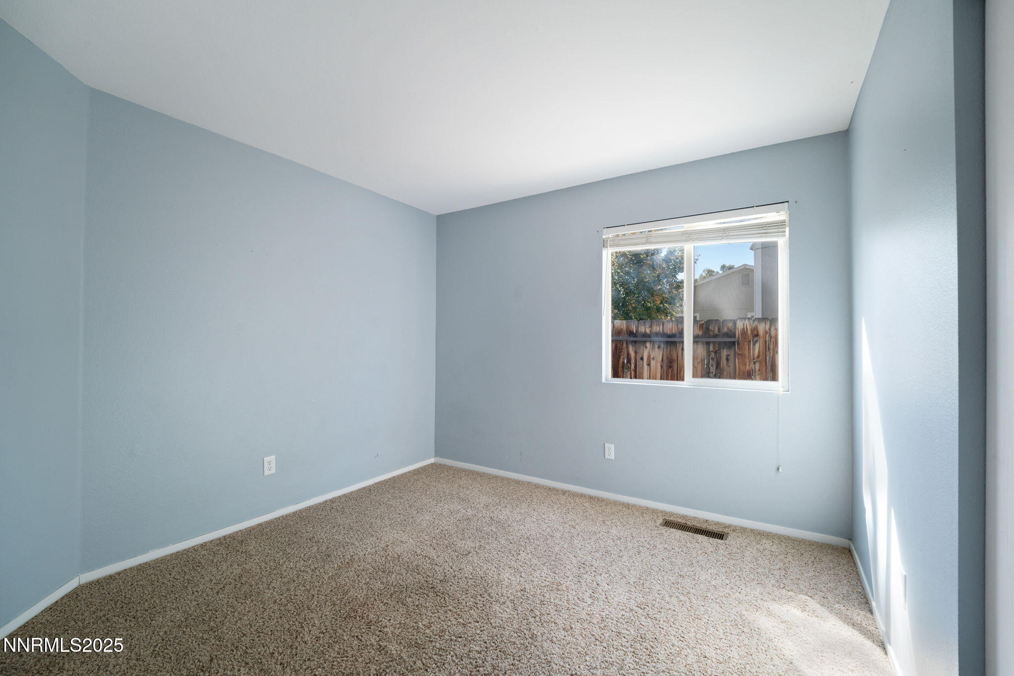 9770 Brightridge Drive Reno, NV 89506 - Photo 19 of 43 an empty room with a window