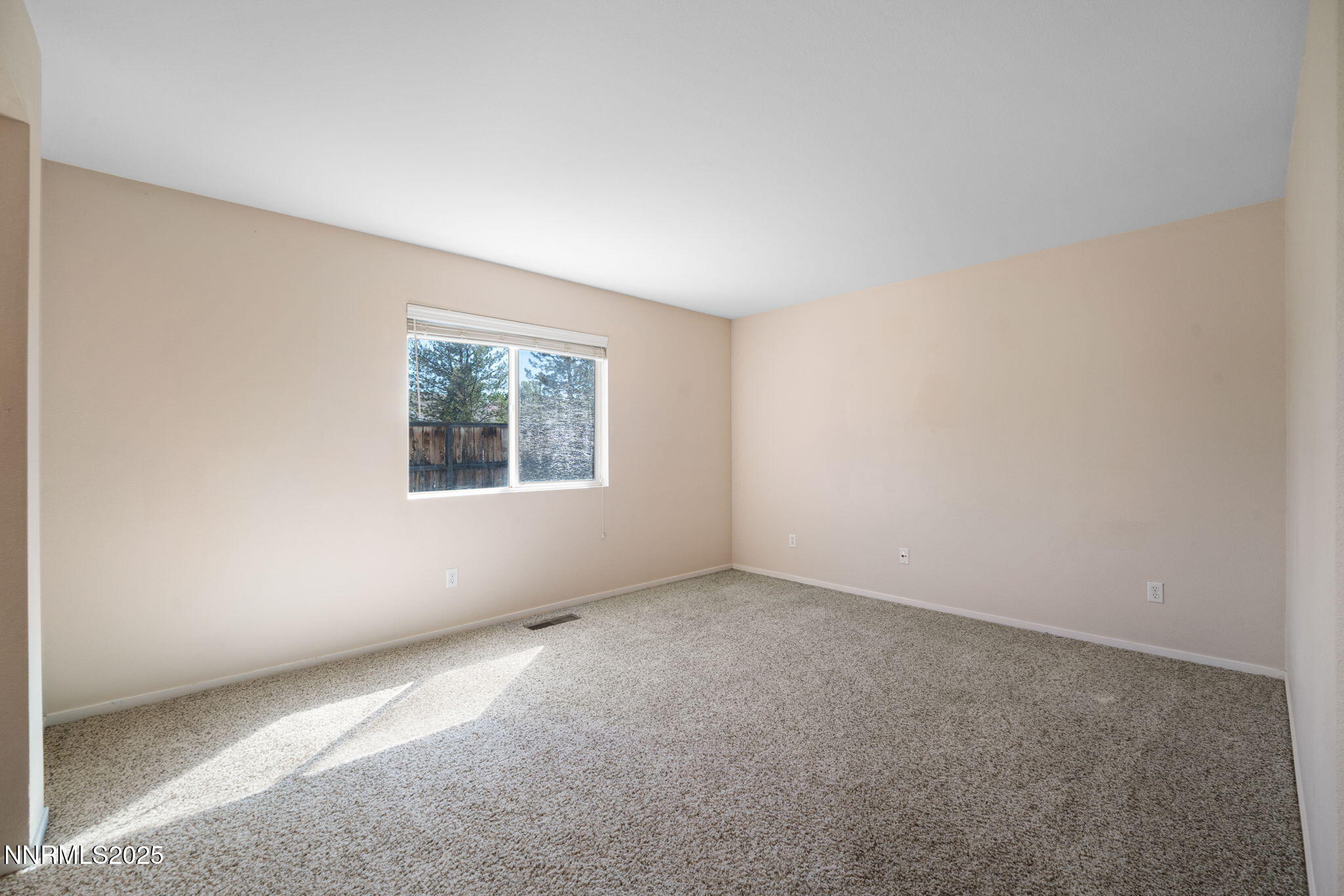 9770 Brightridge Drive Reno, NV 89506 - Photo 20 of 43 an empty room with windows