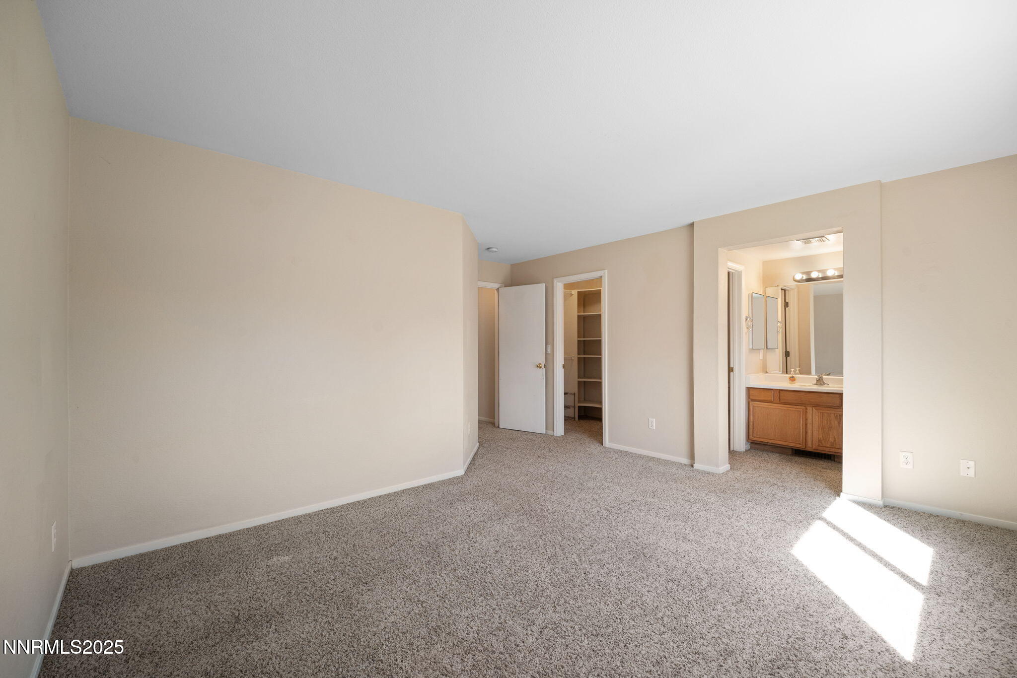 9770 Brightridge Drive Reno, NV 89506 - Photo 21 of 43 a view of an empty room with a window