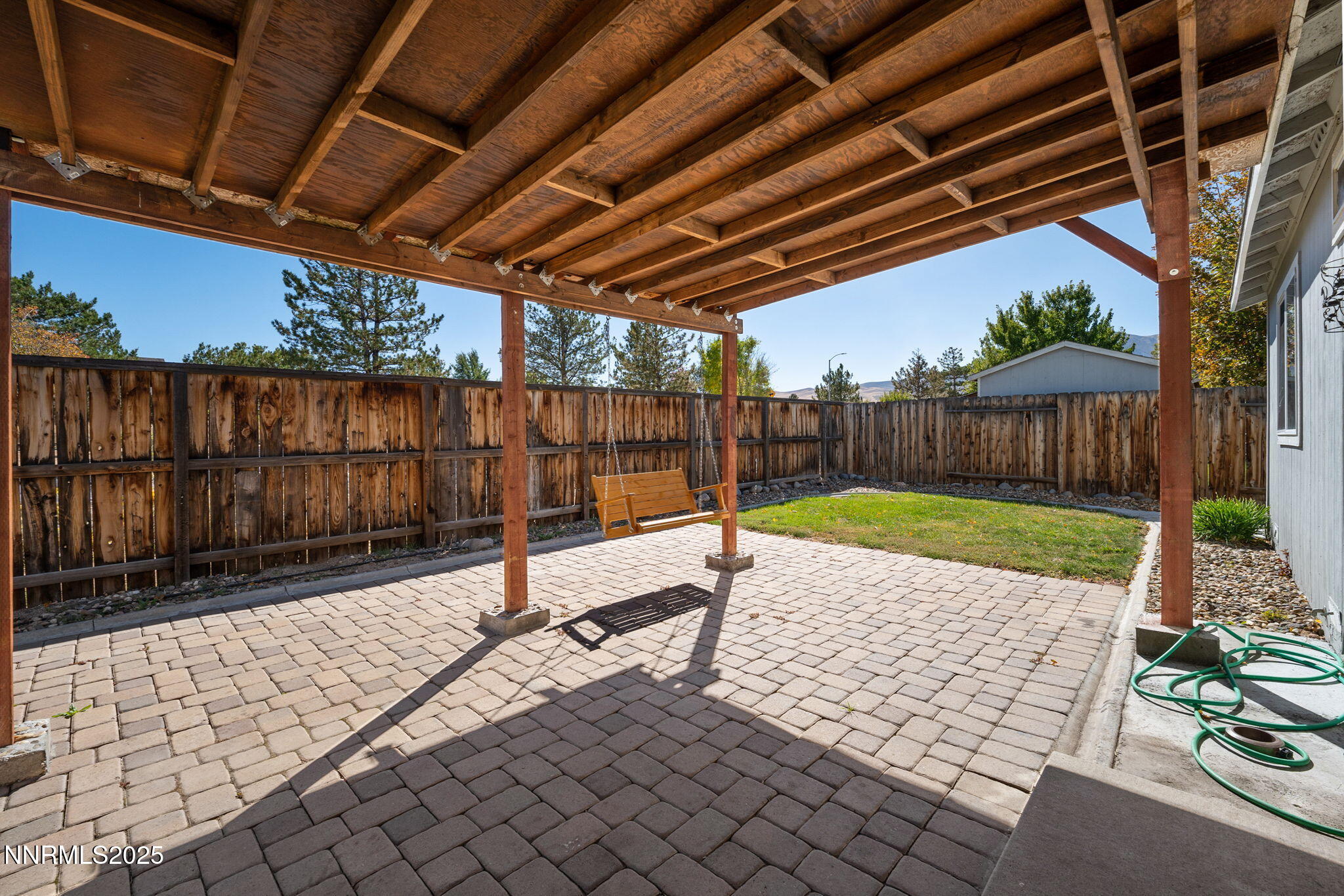 9770 Brightridge Drive Reno, NV 89506 - Photo 25 of 43 a view of backyard with wooden fence