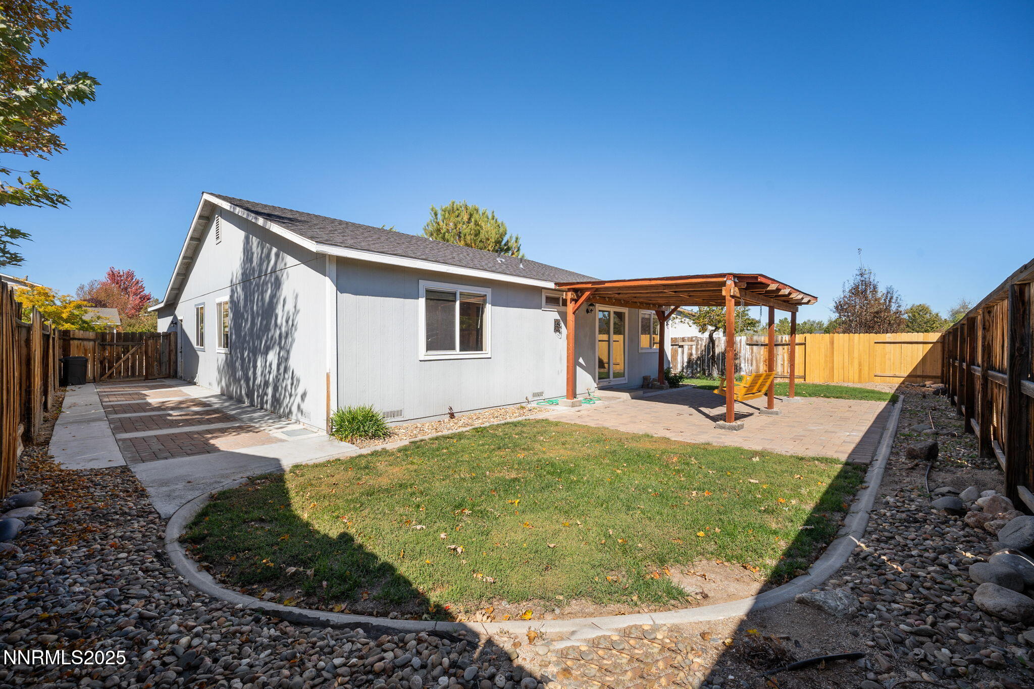 9770 Brightridge Drive Reno, NV 89506 - Photo 28 of 43 a view of a house with backyard