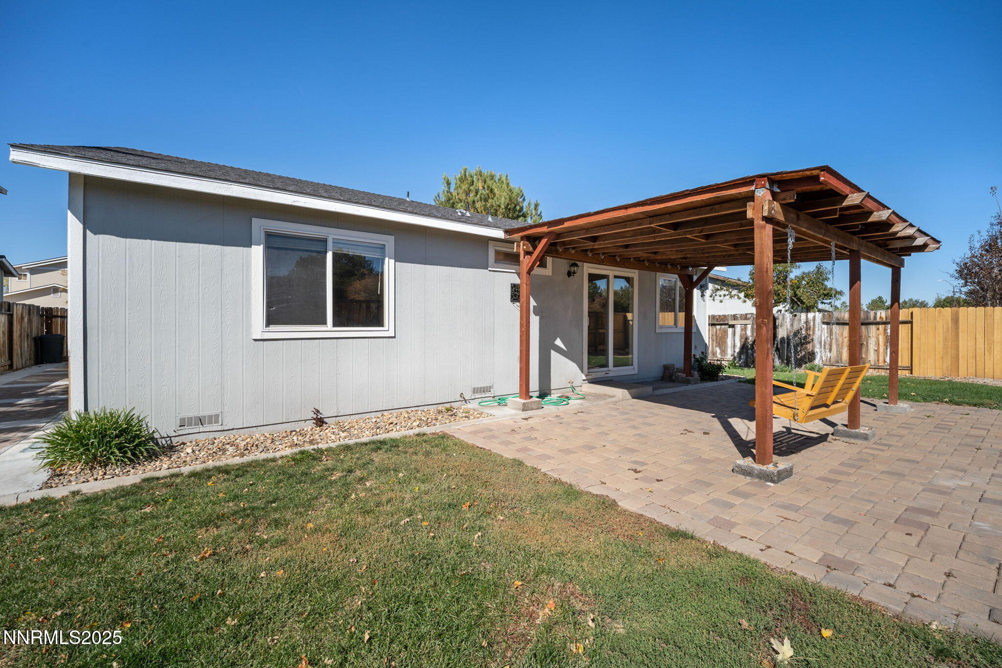 9770 Brightridge Drive Reno, NV 89506 - Photo 29 of 43 a view of a backyard with plants and a table