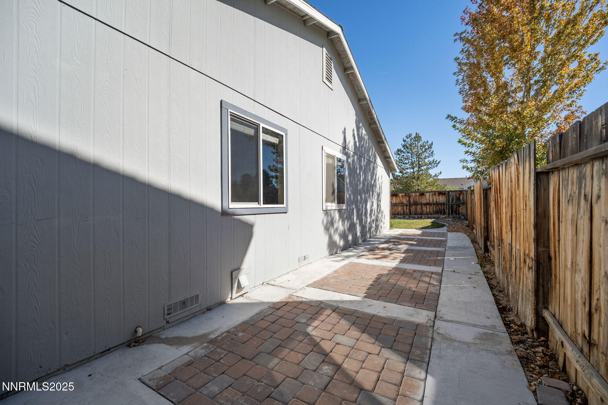 9770 Brightridge Drive Reno, NV 89506 - Photo 30 of 43 a view of a house with a backyard