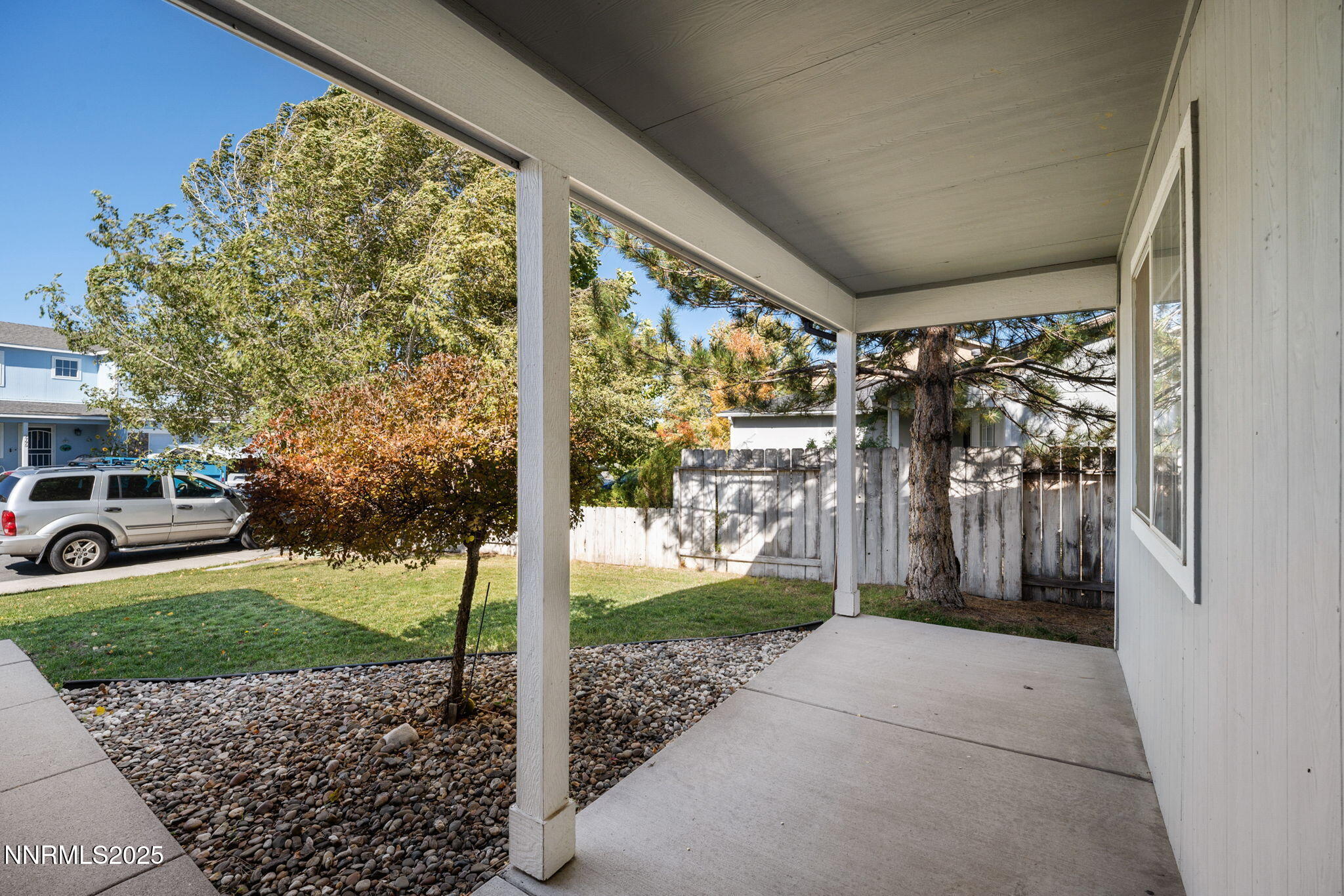 9770 Brightridge Drive Reno, NV 89506 - Photo 35 of 43 a view of a porch with wooden floor and a yard