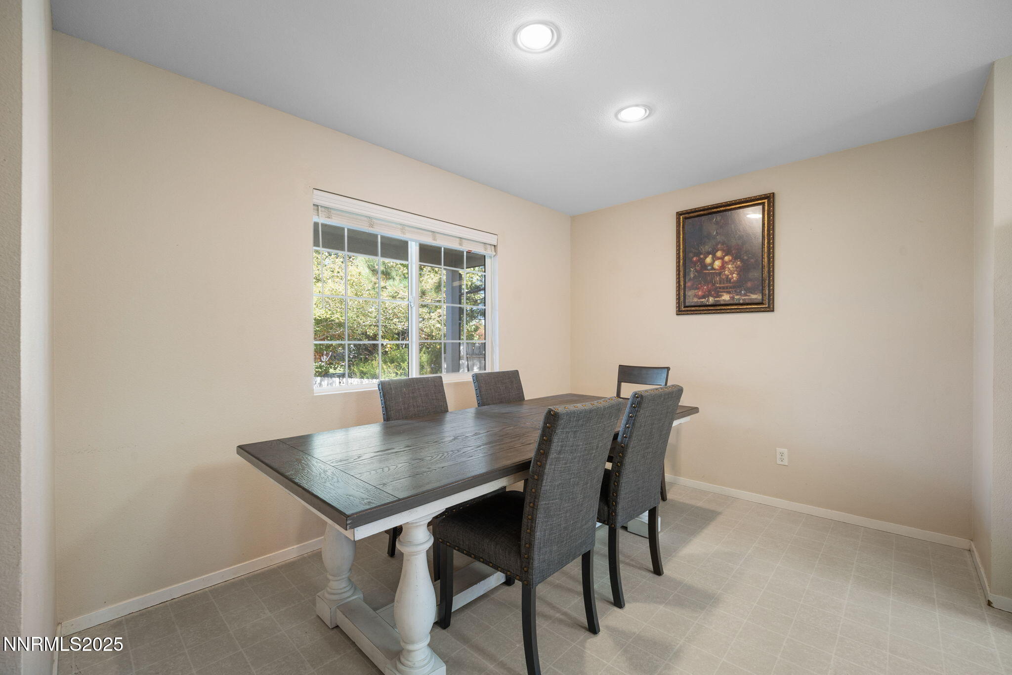 9770 Brightridge Drive Reno, NV 89506 - Photo 8 of 43 a view of a dining room with a table and chairs